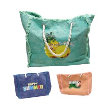 20220728091459-borsa-mare-grande-donna-estate-spiaggia-verde-acuqa-blu-arancione.jpg
